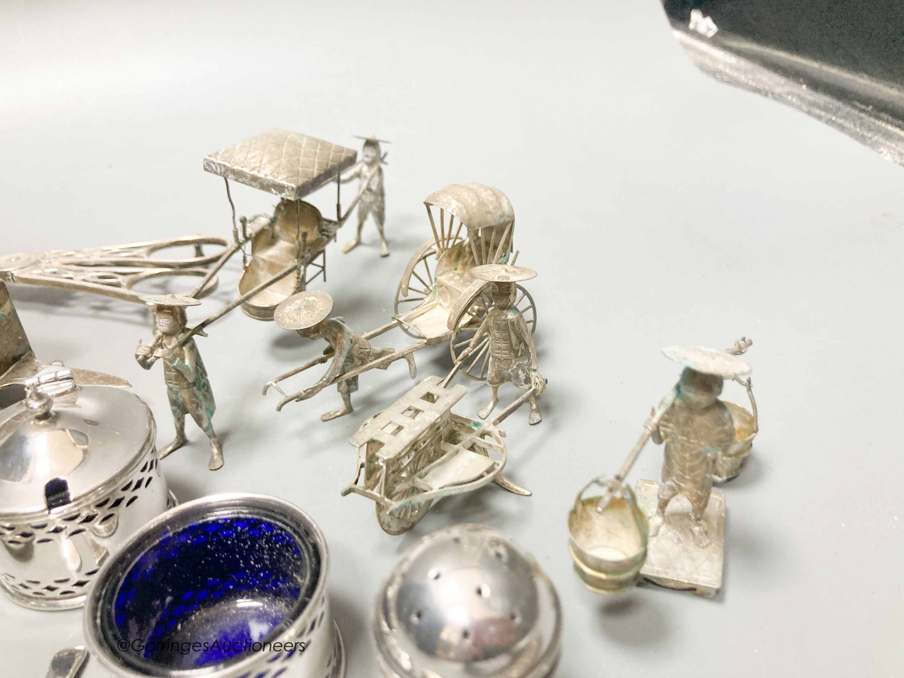 Sundry small silver including a pair of George III silver candle snuffers, Emes & Barnard, London, 1813, 17.4cm, another earlier pair, London, 1795, three silver condiments and other items.